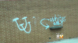 Image showing one of the controversial spray painted messages that five Arlington High School students are accused of leaving on a rival high school